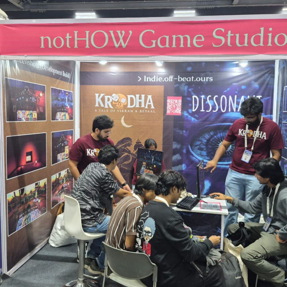 !How Game Studio booth with players trying out games